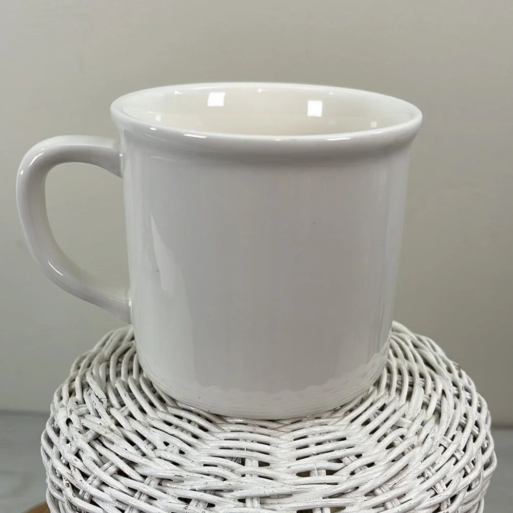 Pottery Barn mug designed by Denise Fielder